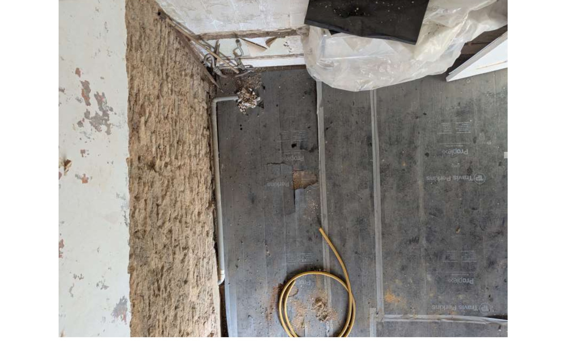 Bathroom II viewed from attic: hole in floor visible