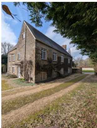Old Manor Farm exterior, the limestone manor house as photographed for Pevsner's Buildings of England