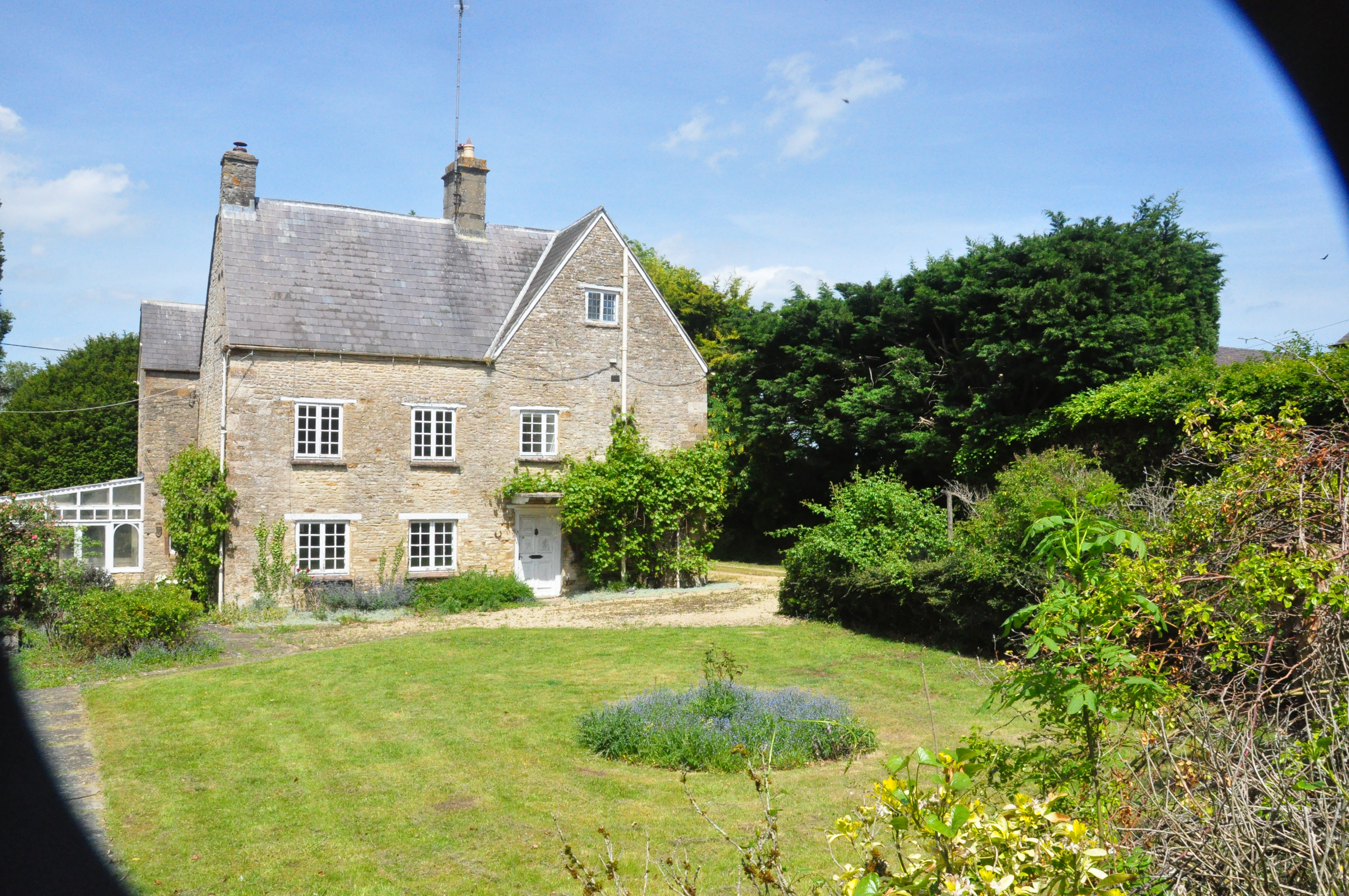 Old Manor Farm front garden in summer, wide panoramic view